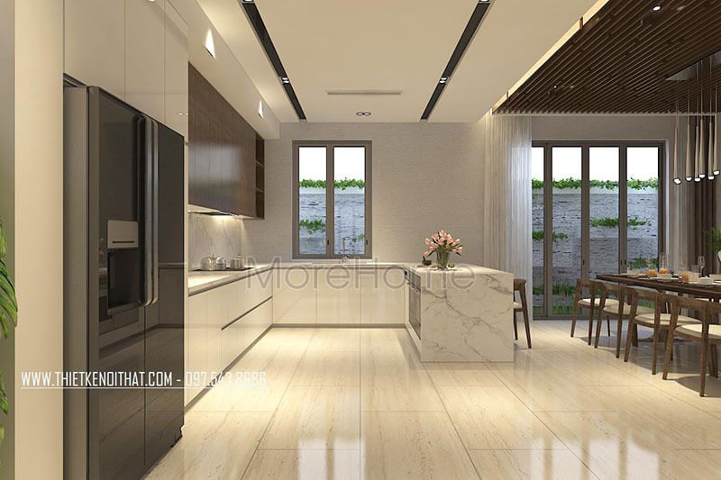 Khu vực bếp được thiết kế hiện đại với tông màu trắng mang đến sự sạch sẽ và ấm cúng tạo nguồn cảm hứng cho những món ăn ngon
